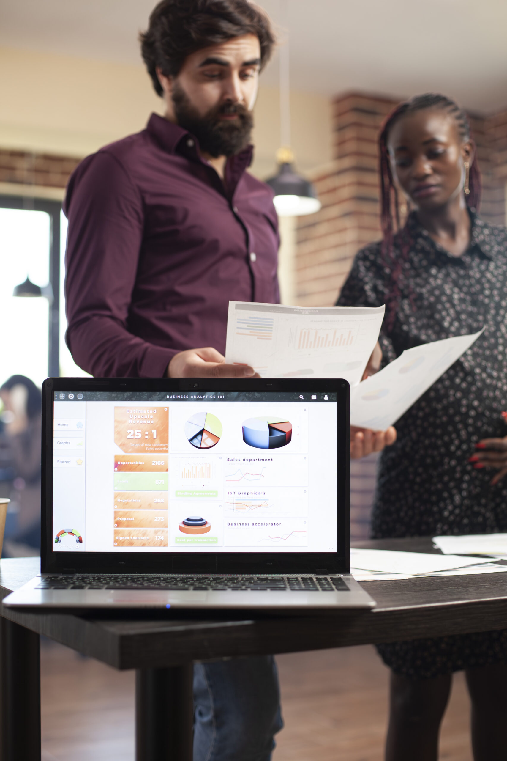 CASE STUDY - landing page 9 laptop desk displaying data charts scaled